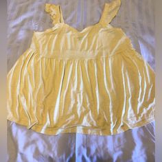 This Is A Nwot Torrid Baby Doll Summer Tank In Pretty Yellow! Cotton Ruffle Tops For Loungewear, Summer Ruffles Top For Loungewear, Cute Ruffled Tank Top For Spring, Casual Cotton Top With Ruffled Straps, Cute Ruffled Solid Color Tops, Casual Cotton Tops With Ruffled Straps, Cute Solid Tops With Ruffles, Cute Solid Color Tops With Ruffles, Cotton Stretch Ruffle Tank Top