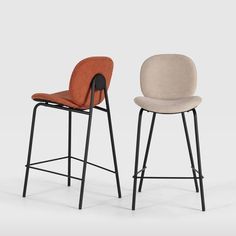 two stools with different colored upholstered backrests, one in black and the other in beige