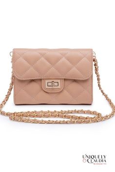 The Wendy Quilted Nude Crossbody Bag is a chic and stylish accessory that is perfect for any outfit. The quilted design and gold lock are eye-catching details that make this bag stand out. The vegan leather interlaced goldtone chain strap is also a unique touch. The inside of the bag features two slip compartments, one zip pocket, and three card slots. This bag also comes with a detachable vegan leather and chain strap, making it extremely versatile. Material: Vegan Leather Closure: Turnlock Cha Gold Crossbody Shoulder Bag With Cc Turnlock Closure, Chic Beige Bags With Cc Turnlock Closure, Chic Quilted Wallet On Chain For Everyday, Chic Shoulder Bag With Cc Turnlock Closure For Travel, Chic Gold Quilted Bag, Chic Quilted Wallet On Chain, Beige Crossbody Flap Bag With Chain Strap, Chic Quilted Clutch Bag, Trendy Rectangular Bag With Cc Turnlock Closure