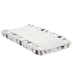 a white changing pad with cartoon animals on the front and back cover, sitting on a white background