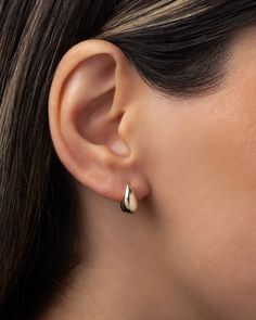 The perfect accessory for every occasion, these 14K Gold Small Teardrop Stud Earrings add a touch of luxury to any ensemble. From a strapless gown to a classic white tee, these earrings elevate your style with their curvaceous, bubbly design. Effortless and feminine, they are a trendy must-have for the fashion-forward woman. Size: Approx. 6mm(W) x 12mm(H) Total Weight: Approx. 1.37 grams (per pair) Standard Production: 2-5 business days Rush Order Production: 1-3 business days Shipping: Select s Elegant Teardrop Hoop Earrings With Polished Finish, Classic Rose Gold Huggie Earrings For Formal Occasions, Elegant Polished Teardrop Huggie Earrings, Elegant Teardrop Huggie Earrings With Polished Finish, Formal Teardrop Huggie Earrings With Polished Finish, Timeless Teardrop Hoop Earrings For Formal Occasions, Classic 14k Gold Earrings With Timeless Design, Classic Hypoallergenic Huggie Earrings For Formal Occasions, Classic Teardrop Huggie Earrings For Everyday