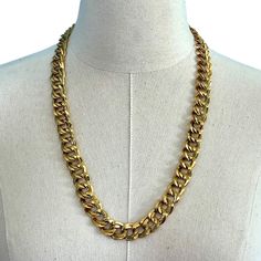 "VINTAGE | Monet Gold Tone Double Cuban Link Chain Necklace | Triple Plated | Hook Closure | 27\" L  - Gorgeous vintage gold tone double Cuban link chain necklace signed Monet  - Heavy, chunky design  - Triple plated, very shiny   - Hook closure  - 27\" length, approximately 1/2\" wide  - Excellent condition, no gold wear noted  - Will arrive packaged in a gift box Please look carefully at the pictures for condition and size, as the pictures are part of the description. I am happy to answer any questions and provide additional photos if necessary. A Note on Vintage Items: Vintage items are at least 20 years old and unless they have been kept in their original packaging and hidden away, they have had 20 or more years of handling, wear and tear. They are often not in perfect condition, rathe Vintage Yellow Gold Curb Chain Necklace, Antique Gold Necklace With Curb Chain, Formal Gold Necklace With Chain Strap, Antique Gold Curb Chain Necklace, Gold Metal Cuban Link Chain Necklace, Retro Gold Jewelry With Adjustable Chain, Gold Metal Cuban Link Necklace, Vintage Yellow Gold Chain Link Necklace, Vintage Brass Jewelry With Chunky Chain