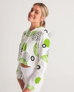 About The Art Lime-et-less Lucky Lime playing with limes to create whimsical patterns...FUN is Lime-et-Less!!! Product Details Crush your next workout in this super cute Women's Cropped Hoodie. Its ultra-soft fabric feels great against your skin and is a lounge worthy staple for every woman. Soft, breathable fabric Adjustable hood drawcords Silver metal detail Printed, cut, and handmade Size & Fit Oversized fit, cropped length Hits above hips Model is 5'11" wearing size Small Model's bust is 34B Spring White Fitted Sweatshirt, White Fitted Sweatshirt For Spring, Fitted White Sweatshirt For Spring, Trendy White Stretch Hoodie, White Stretch Hoodie For Spring, Trendy Fitted White Sweatshirt, Green Hooded Top For Spring, White Fitted Trendy Hoodie, Spring Green Hoodie Top