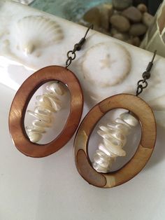 Oval brown shell and mother of pearl nugget earrings Handmade Oval Brown Earrings, Brown Oval Earrings As A Gift, Brown Oval Earrings Gift, Brown Oval Earrings For Gift, Nugget Earrings, Oval Earrings, Disc Earrings, Oval Earring, Pearl Drop