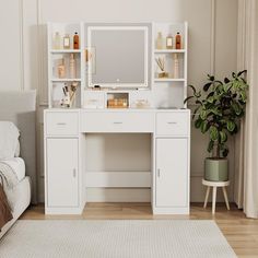 a white desk with a mirror and shelves on it in front of a couch next to a potted plant