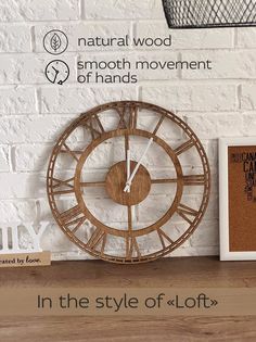 a clock sitting on top of a wooden shelf next to a sign that says in the style of lofts