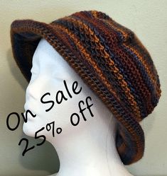 The Brim Beanie is made from Lionbrand Landscapes yarn which is 100% Acrylic and very soft.  The color is shades of blue and brown.  It is made lovingly in a smoke free home.  It is packable for travel or fun for wearing about town.  A good back to school item.  Care instructions are included. Hand or machine Wash, cool water. Dry Flat.  Do Not Iron.   Do Not Bleach. The hat will fit a head circumference of 20"-22" This hat is chemo friendly and made from a pattern by DROPS DESIGN. See other hats in my shop at https://somdesignsandco.etsy.com.  If you like our shop, please link to us at https://somdesignsandco.etsy.com on your favorite social media. Brown Crochet Hat With Curved Brim For Fall, Warm Crochet Hat For Outdoor Fall Activities, Warm Crochet Hat For Outdoor Fall Use, Warm Brown Hats For Outdoor, Warm Brown Hat For Outdoor, Brown Crochet Hat With Curved Brim For Outdoor, Outdoor Brown Crochet Hat With Curved Brim, Brown Curved Brim Crochet Hat For Outdoor, Hand Knitted Adjustable Hat For Fall