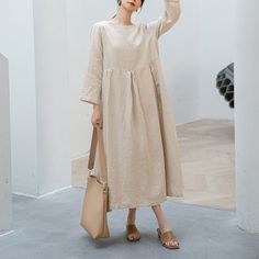 "Cool and comfortable for hot summer days, this natural linen dress is elegant and stylish.    It is a wonderful wardrobe staple that's a timeless classic you'll wear again and again.Pure natural linen materials, comfortable, breathable, refreshing and soft fabric. All our items are Tailored and Handmade and Made to Order ,I can make Any Size . I design new styles every week, please collect my store. I believe that you will meet your favorite styles. ★★FEATURES Linen 55% + Cotton 45% ( Medium Weight，Comfortable, Breathable and Washed Soft fabric) Two side pockets Round neckline 3/4 sleeve Pleated waist details Loose linen dress Casual dress Long linen dress Simple dress Perfect for Summer, Spring ★★Size Chart: ❤ Size chart is the garment's measurements, Not body measurements . Size S: Leng Casual Natural Linen Dress, Spring Daywear Linen Dress, Spring Neutral Linen Dress, Long Sleeve Ramie Summer Dresses, Casual Beige Linen Long Sleeve Dress, Beige Long Sleeve Casual Linen Dress, Casual Beige Long Sleeve Linen Dress, Beige Ramie Linen Dress For Summer, Spring Linen Dress For Daywear