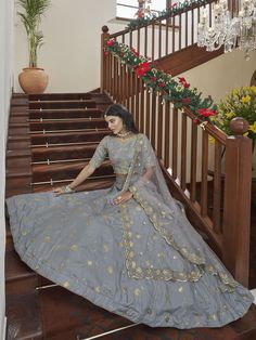 Buy beautiful sky grey art silk embroidered lehenga choli for celebrating upcoming festival celebration. Shop this fantastic lehenga choli which comes with Gajji Silk blouse and Gajji Silk dupatta. Designer Gray Set With Zari Work, Festive Gray Zari Work Sets, Gray Anarkali Set With Zari Work, Gray Anarkali Set With Dupatta, Gray Anarkali Set For Festive Occasions, Festive Gray Diwali Outfit Sets, Festive Gray Sets With Dupatta, Gray Festive Sets With Resham Embroidery, Gray Festive Sets For Diwali