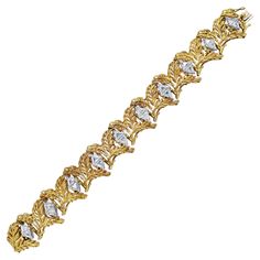 An antique and vibrant bracelet showcasing an intricately beautiful leaf-like designed set in a 18k Yellow Gold and accented with 20 trillion cut diamonds weighing 7.40 carats total. Luxury Yellow Gold Leaf-shaped Jewelry, Retro Bracelet, Golden Leaf, Bracelet Diamond, Leaf Bracelet, Feuille D'or, Golden Leaves, Lovely Jewellery, Diamond Bracelets