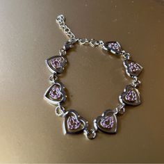 Brand New, Silver Bracelet With Pink Cubic Zirconia Diamonds Inside Heart Silver Heart Charm Bracelet For Party, Elegant Silver Heart Bracelet With Rhinestones, Adjustable Silver Metal Heart Bracelet, Adjustable Crystal Heart Bracelet For Party, Silver Dainty Bracelet For Valentine's Day, Dainty Silver Bracelets For Valentine's Day, Dainty Silver Bracelet For Valentine's Day, Silver Crystal Bracelet With Bling As Gift, Silver Cubic Zirconia Charm Bracelet For Party