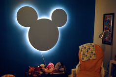 a mickey mouse light up wall in a child's room