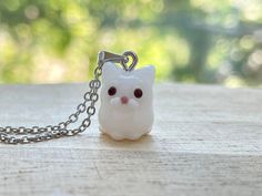 This white cat glass beads necklace is cute and dainty, which are perfect gifts for kids and friends.  They are made of the following: 🔹 Handmade glass beads: H13 x W10 x D12mm (0.5-1mm variation).  Each bead is unique so there is a slightly different from bead to bead. 🔹 Necklace chain: gold / silver plated over brass 🔹 Necklace Length: choose the exact length of the chain (the length includes clasp and findings).   【PLEASE NOTE THE FOLLOWINGS BEFORE PURCHASE】 ✔ VAT, GST and any other taxes Cute White Jewelry As Gift, Cute White Jewelry For Gifts, Cute White Jewelry For Gift, Whimsical White Necklaces For Gifts, Whimsical White Necklace For Gift, Whimsical White Necklace Perfect For Gifts, Cute White Nickel Free Necklaces, Cute White Nickel-free Necklaces, Handmade White Kawaii Necklace