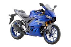 a blue motorcycle is shown on a white background