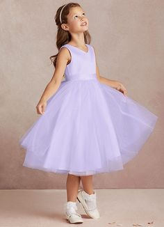 Marlee is the charming choice for your flower girl on the very special day. Cut from matte satin & tulle, she features a V-neckline, poofy A-line skirt with ruching along the waist, a belt over her tea length skirt, and bows along her V-back. Flower Girl Dresses Lavender, Lavender Flower Girl Dress, Lilac Flower Girl Dresses, Tea Length Flower Girl Dress, Purple Flower Girl Dress, Tea Length Tulle, Tea Length Skirt, Tulle Flower Girl, White Flower Girl Dresses