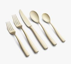 four forks, two spoons and one knife on a white surface with no background