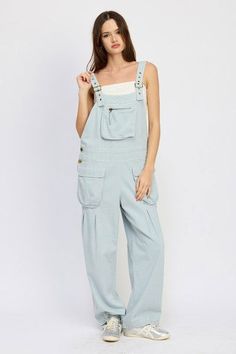 Expertly crafted with 100% cotton, the Emory Park Oversized Cargo Overalls offer superior comfort and durability. Perfect for any occasion, these overalls are a must-have for any wardrobe. SIZE & FIT :MODEL WEARS SIZE SMALLMODEL'S HEIGHT 5'9 Made In : IMPORTED Fabric Contents : 100% COTTON Cargo Overalls, Contemporary Outfits, Clothing Brand, Quality Fabric, Must Haves, Overalls, Jumpsuit, Rompers, Womens Dresses