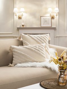 a living room with a couch and some pillows