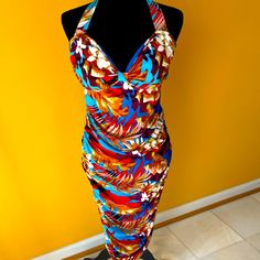 Brand New, Great Condition, Floral Halter Dress With Neck Tie Closure And Partial Back Out Detail, Back Zipper Closure, Side Ruching And Very Comfortable With Stretch Multicolor Ruched Midi Dress For Vacation, Vibrant Print Halter Neck Dress For Party, Vibrant Print Halter Neck Party Dress, Halter Neck Dress With Vibrant Print For Party, Party Dress With Vibrant Print And Halter Neck, Multicolor Sleeveless Floral Dress With Vibrant Print, Floral Print Beachwear Dress For Party, Fitted Multicolor Ruched Maxi Dress, Multicolor Floral Print Beachwear Dress