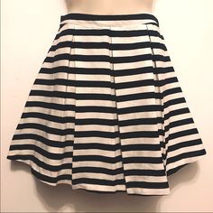 Size: Medium Color: Black, White Style: Skater Skirt, A-Line, High Waist, Pleated, Left Side Zip Material: 55% Linen/45% Rayon Measurements: 28” Waist, 17.5” Length Condition: Nwt - Perfect Condition - No Flaws, Snags, Holes, Stains, Etc. - Pet And Smoke Free Environment - Stored And Shipped In Ventilated, Plastic Bags To Ensure Quality Chic Striped Mini Skirt With Lining, Short Striped Skirt For Spring, Chic Relaxed Skirt With Striped Hem, Chic Skirt With Striped Hem And Relaxed Fit, Chic Striped Stretch Skirt, Chic Black And White Skirt For Spring, Chic Striped Cotton Skirt, Chic Fitted Skirt With Striped Hem, Chic Spring Skirt With Striped Hem