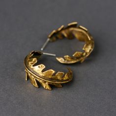 If you are a nature lover, these statement brass fern open hoop earrings were created for you. They are large and colorful to be your evening pair of hoops, but you can easily wear them for every day. They are not very lighweight as they are made of steady brass sheet, but not too heavy also.  The hoops diameter is 1.6" (4 cm), width 0.8" (2 cm), ear wires are made of sterling silver. These leaves are free cut and formed and may vary slightly. Please see other stud earrings here: https://www.ets Fern Earrings, Brass Sheet, Lover Jewelry, Open Hoop Earrings, Fall Earrings, Jewelry Earrings Hoops, Ear Wires, Nature Lover, Jewelry Gift