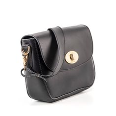 This women's shoulder bag combines style and functionality, perfect for every occasions. The modern design is enriched by a brass swivel lock, which adds a touch of elegance, allowing you to keep your personal belongings safe. The shoulder strap ensures optimal comfort, fitting perfectly around it. This bag is the ideal accessory to complete every outfit with style. Made with Vegetable Tanned Leather  Fashion Design for every kind of Elegance Vegetable Tanned Leather Modern Evening Saddle Bag With Turn-lock Closure, Classic Crossbody Box Bag For Travel, Classic Crossbody Travel Box Bag, Black Flap Bag With Turn-lock Closure For Office, Classic Travel Crossbody Box Bag, Timeless Satchel With Detachable Strap And Clutch Shape, Timeless Satchel Bag With Turn-lock Closure, Chic Everyday Satchel With Turn-lock Closure, Timeless Flap Bag With Adjustable Strap For Daily Use