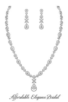 an elegant necklace and earrings set with cubicles on the side, in white gold