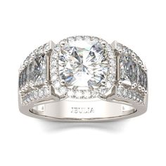 a white gold ring with two rows of diamonds on the band and an oval center stone surrounded