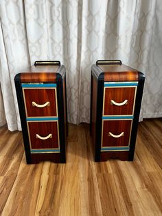 two wooden nightstands sitting next to each other on top of a hard wood floor