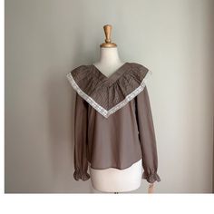 Vintage Victorian Style Romantic Blouse https://www.etsy.com/roguegirlvintage/listing/1496301860 Spring Blouse With Lace Trim And Cute Collar, Cottagecore Blouse With Lace Collar, Spring Long Sleeve Blouse With Lace Collar, Spring Tops With Lace Trim And Cute Collar, Spring Blouse With Lace Collar And Long Sleeves, Spring Blouse With Peter Pan Collar And Lace Trim, Spring Cottagecore Blouse With Lace Collar, Spring Blouse With Lace Trim And Peter Pan Collar, Spring Doll Collar Tops With Lace Trim