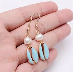 Gold Metal Ocean Blue Cowrie Shell  Pearl Bohemian Dangle Earrings  | eBay Blue Earrings For Vacation, Cowrie Shell, St Kitts, Ocean Blue, Blue Ocean, Gold Metal, Gemstone Rings, Shells, Dangle Earrings