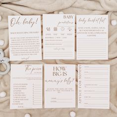 the wedding stationery is laid out on a blanket