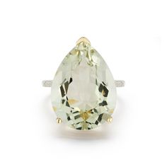 14kt Green Amethyst Tear Drop Ring Bold tear drop Green Amethyst is beautifully set in solid gold and accentuated with diamonds on the shank. This ring is bound to stand out and catch everyone's attention. We adore simply bold statement ring. 14kt Yellow Gold 4.45gm Gold 0.15ct Diamonds 39.75ct Pear Drop Green Amethyst 20mm x 15mm Green Amethyst Made in New York Formal Pear-shaped Amethyst Ring With Prong Setting, Formal Teardrop Amethyst Ring In Fine Jewelry Style, Elegant Pear-shaped Amethyst Ring For Formal Occasions, Luxury Teardrop Gemstone Rings, Elegant Formal Pear-shaped Amethyst Ring, Elegant Teardrop Ring With Gemstone Accents, Elegant Teardrop Rings With Gemstone Accents, Elegant Teardrop Amethyst Gemstone Ring, Teardrop Amethyst Ring For Formal Occasions