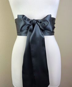 "Charcoal Gray Sash  Dark Gray Satin Sash  Extra Long Sash  Formal Dress Sash  Satin Sash Belt  Bridesmaid Wedding Dress Sash  Satin Swank  Make this Satin Swank® reversible waist sash the perfect finishing touch for your wedding, bridesmaid, or special occasion dress, or just the right piece to add instant polish to your dress or top.  This extra long version is 3.5 inches wide, 120 inches long, and will wrap around most waist sizes two times with a generous length remaining to tie in a bow or Black Satin Finish Dress For Wedding, Black Satin Finish Wedding Dress, Fitted Sashes With Satin Bow, Wedding Sash With Tie Back, Fitted Evening Sash With Tie Back, Fitted Tie Back Sash For Evening, Satin Bridal Belt For Party, Elegant Satin Sash With Tie Back, Satin Bridal Belt For Bridesmaids