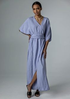 "The perfect summer dress. Light and breezy as it should be, but protective enough when the weather gets moody. Offered in medium-weight linen. STYLE DETAILS * Regular fit * Wrap-like silhouette (snap fastening) * Short kimono-cut sleeves  * Elasticated waistband * Side pockets * Maxi-length  * Optional belt * French seams inside * Made from medium-weight linen. SIZES & COLORS IN THE PICTURES * Model is wearing size S/M in Iris Blue (medium) linen. Model's height - 178 cm (5'10\"), bust - 85 cm (33.5\"), waist - 63 cm (24.8\"), hips - 86 cm (33.9\").  CUSTOMIZATION * Customization is possible, but such items are non-changeable & non-refundable * There is extra charge depending on the particular customization * If you want a customization, message us with your measurements and specific requ Spring Linen V-neck Kaftan, Linen Maxi Dresses For Loungewear, Flowy Linen Dress For Loungewear, Oversized Linen V-neck Maxi Dress, Spring Maxi Dress With Tie Waist And Kimono Sleeves, Oversized Linen V-neck Dress, Oversized Linen Maxi Dress With V-neck, Summer Wrap Maxi Dress For Daywear, Bohemian Linen Tunic Maxi Dress