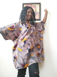 Kitenge African Fabric Mud cloth oversized kimono Handmade dress top made from 100% cotton fabric. On size fits most. Oversized Cotton Tunic, Bohemian Tunic With Batwing Sleeve And Relaxed Fit, Oversized Short Sleeve Poncho, Oversized Cotton Bohemian Blouse, Bohemian Cotton Top With Batwing Sleeves, Bohemian Cotton Tops With Batwing Sleeves, Bohemian Oversized Blouse With Batwing Sleeves, Oversized Bohemian Tunic Blouse, Oversized Cotton Tunic With Short Sleeves