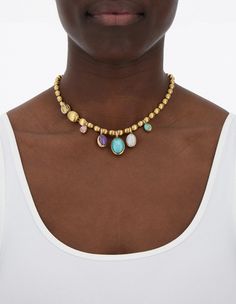 Our iconic Ivy necklace becomes a colorful choker, crafted in 18kt gold and intricately hand-engraved using the ancient burin-tool technique. Add a twist to your look with the lively Boules charms, easily attachable thanks to their practical clasps. Experiment with the different shades and sizes to create unique and eclectic styles, as seen in our styling that features PS4-609, PS13-609, PS7-609, PS9-609, PS14-609, PS2-609, PS15-609. Ivy Necklace, Colorful Choker, Stackable Necklaces, Special Occasion Jewelry, Jeweled Earrings, Choker Collar, Layered Bracelets, Cuff Bangles, Hand Engraving