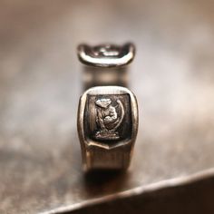 Ring with a pair of Gargoyles stamped on -Please provide your phone number for the packing slip when you check out- . Made of oxidized 925 silver by more than 20 years experienced jewelry smith . Item code: RS-158 . Width: 10mm, Thickness: 2mm, weight: 13g . Vintage finishing applied for aged look . Hallmarks could be replaced without notification Gargoyle Ring, Personalised Jewellery Necklaces, Word Ring, Diamond Monogram, Medieval Rings, Rustic Ring, Rustic Rings, Carved Ring, Ring Mens