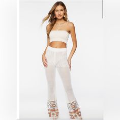 Forever 21 | Cream/White Crochet Flare Beach Pant Cover Up With Brown Crochet Design At The Bottom, Size Large. White Fitted Bottoms For Beach Party, Fitted White Bottoms For Beach Party, Fitted Summer Pants For Beach Season, White Bohemian Pants For Beach Season, Fitted Summer Pants For Vacation, Fitted White Beach Pants, White Fitted Pants For Beach Season, Fitted White Pants For Beach Season, Forever 21 Bottoms For Beach Vacation