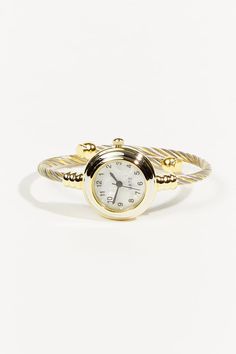 This stylish timepiece seamlessly blends multiple metals into an eye-catching design, creating a unique accessory that effortlessly complements any ensemble. Round Watch, Camera Icon, Altar'd State, Accessories Unique, White Shop, Shoe Shop, Time Piece, Watch Bands, Gift Card