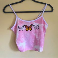 Brand New Top, Tag Still On Soft Cropped Pink Marble Tank 3 Butterflies Imprinted Product Similar To Brandy Melville And Urban Outfitters Super Cute And Trendy Size Medium Trendy Butterfly Top For Spring, Trendy Butterfly-shaped Top For Spring, Trendy Butterfly-shaped Tops For Spring, Trendy Butterfly Shaped Tops For Spring, Trendy Summer Tops With Butterfly Embroidery, Summer Fitted Tops With Butterfly Embroidery, Fitted Summer Tops With Butterfly Embroidery, White Butterfly Print Summer Tops, Summer Cotton Tops With Butterfly Print