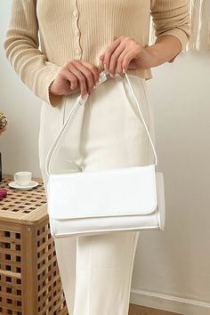 KOODING carries the latest jury crossbody bags. KOODING is the global leading shopping website in providing authentic Korean fashion, beauty and lifestyle items, including clothing, cosmetics, shoes, accessories, and bags in affordable, fast, easy, and safe way. Trendy White Square Flap Bag, White Flap Bag With Large Capacity, White Large Capacity Flap Bag, White Rectangular Flap Bag For Mobile Phone, White Large Capacity Crossbody Flap Bag, Trendy White Shoulder Flap Bag, White Square Flap Bag With Mobile Phone Holder, White Tote Flap Bag With Large Capacity, White Satchel With Single Shoulder Strap