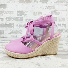 New Origin Imported Outer Material Canvas Closure Type Lace Up About The Brand: Championing Artistry And Function In Women's Footwear. Canvas Espadrille Wedge Sandal In Mango Canvas With Braided Wedge Self-Tie Ankle Wrap Closure Lightly Padded Leather Insole Smooth Man-Made Sole Purple Wedge Heel Sandals In Synthetic Material, Purple Synthetic Wedge Heel Sandals, Casual Purple Wedge Sandals For Summer, Purple Wedge Heels For Summer, Purple Wedge Sandals For Summer, Purple Wedge Heel Sandals For Summer, Purple Wedge Heel Sandals For Beach, Purple Summer Wedge Sandals, Summer Purple Wedge Sandals