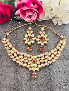 This stunning jewellery set from Harkirt trade is a must-have for any woman who loves traditional Indian jewellery. The set includes a beautiful necklace and earrings, both featuring intricate Kundan designs in a stunning gold colour. The adjustable features of the necklace and earrings make them perfect for any size of wearer, and the East Indian ethnic style adds a touch of elegance to any outfit. Made in India, this jewellery set is a true piece of art that is sure to impress. Heavy Kundan Jewelry Sets For Festive Season, Heavy Kundan Jewelry Sets For Festive Occasions, Kundan Jewelry Sets For Puja And Festivals, Heavy Jewelry Sets For Puja And Festive Seasons, Heavy Jewelry Sets For Puja And Festive Occasions, Bollywood Heavy Jewelry Sets For Puja, Heavy Bollywood Jewelry Sets For Puja, Kundan Jewelry Sets For Diwali Puja, Diwali Kundan Jewelry Sets For Puja