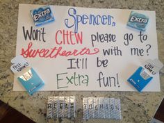 a sign that has been placed on the counter for someone to put their name on