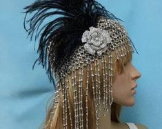 Unique flapper cloche stretches to fit any head.  Perfect for Flapper, Gatsby event.      Hat can be made in silver or gold.  Feather can be white or black. Flapper Headpieces For Costume Party, Fitted Flapper Headpieces For Costume Party, Fitted Flapper Headpieces For Evening, Fitted Flapper Style Headpiece For Evening, Fitted Flapper Style Evening Headpieces, Flapper Hat Headpiece For Party, Gatsby Style Headpieces For Costume Party, Flapper Party Hat Headpiece, Gatsby Style Fitted Headpiece For Costume Party