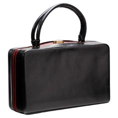 Elegant fine handbag from the great Italian fashion house Gucci from the 1950s-60s. The model shown is a small, rigid, double-handled handbag bauletto. Made of black leather conn central inserts in fiery red leather. Its closure is in gold metal . Inside we find a lining also in the red leather with made several pockets to insert small items. Inside there is also a small coin purse also made of red leather. Inside near the pockets is the original Gucci logo. This small bag is ideal for galas, an Gucci Rectangular Satchel For Shopping, Vintage Gucci Evening Bags, Gucci Formal Handheld Shoulder Bag, Gucci Handheld Shoulder Bag For Formal Occasions, Formal Gucci Handheld Shoulder Bag, Vintage Gucci Rectangular Bag, Vintage Gucci Top Handle Shoulder Bag, Vintage Gucci Top Handle Bag, Retro Gucci Evening Bags