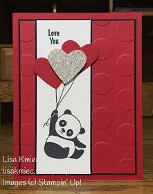 a card with a panda holding a heart shaped balloon