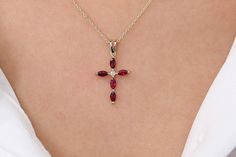 "Ruby Cross Necklace / 14k Gold Genuine Ruby and Diamond Pendant / July Birthstone Present / Gold Ruby Cross / Communion / Confirmation Gift Features ✔Made to Order ✔Gold Kt: 14K (also available in 18K) ✔Available Gold Color: Rose Gold, Yellow Gold, White Gold ✔Marquise Ruby: 5 pc 4x2MM ✔Round Diamond: 1 pcs 1.75MM ✔Total Diamond CTW: 0.025ctw ✔Total Ruby CTW: 0.63ctw ✔ Diamond Color Clarity: G Color Si Clarity ✔Ready to Ship in 7-10 Business Days If you have any additional questions about this Jewelry Cross, Jewelry Accessories Ideas, Confirmation Gifts, Accessories Ideas, Gold Necklace Designs, July Birthstone, Cross Jewelry, Diamond Color, Gold Yellow