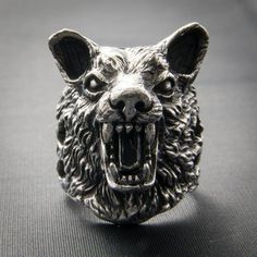 *  Amazing Details in this Wolf Ring*  Hand made in our workshops in Devon*  .925 fully hall marked sterling silver ring*  Available in M - Z (use the drop down menu to order)*  Special Sizes are available on request Medieval Silver Jewelry For Halloween, Werewolf Accessories, Wolf Ring Art, Werewolf Ring, Wolf Rings, Viking Wolf Arm Ring, Viking Style Silver Jewelry With Wolf Design, Viking Style Silver Wolf Design Jewelry, Nordic Compass